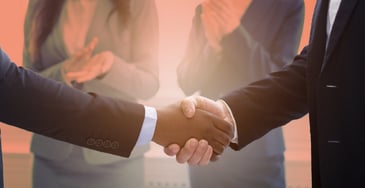 hands shaking with orange background chaser partner programme accounts receivables automation software