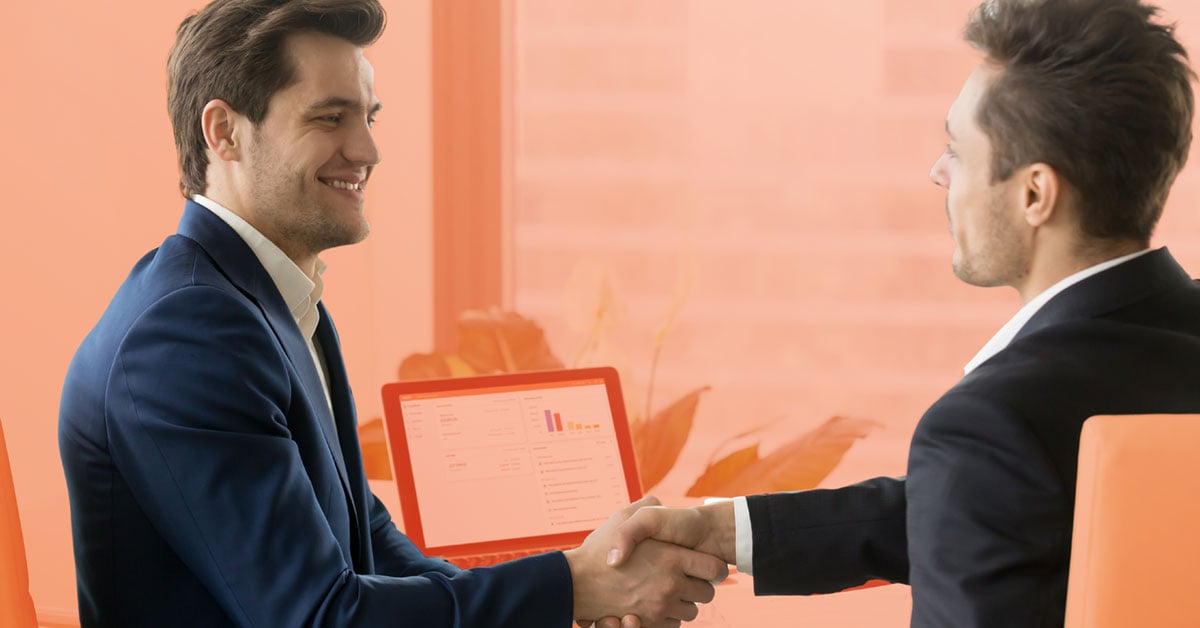 A businessman and an accountant shaking hands with Chaser credit control software in the background