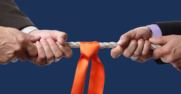 two hands tugging orange rope solving an invoice dispute