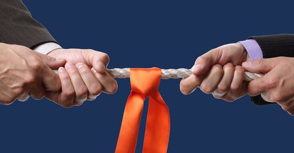 two hands tugging orange rope solving an invoice dispute