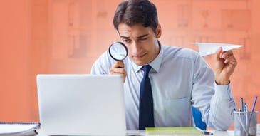 Man on laptop credit checking his customers with Chaser