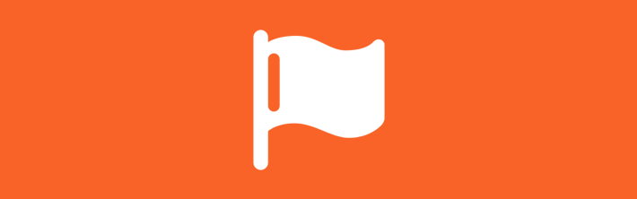A white flag icon on an orange background